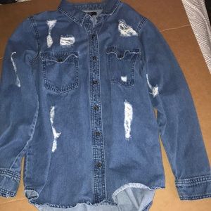 Distressed blue jean shirt